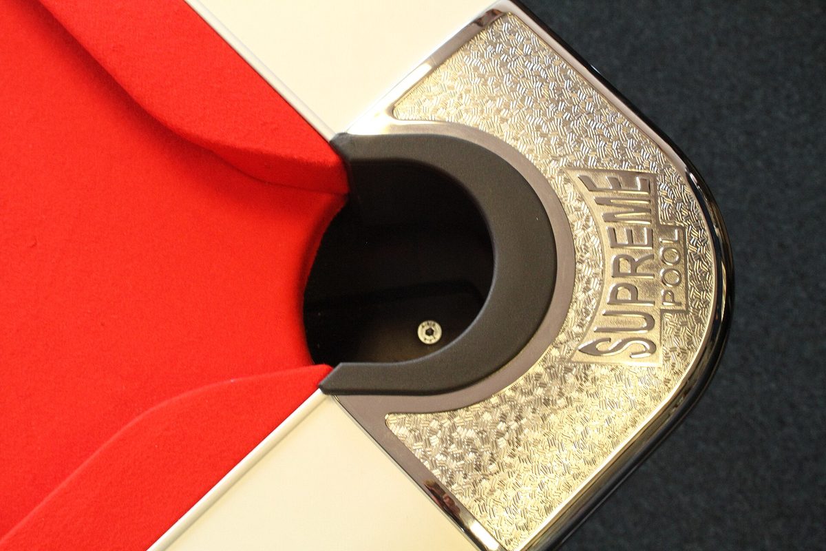 A British-style corner pocket, where the cushion meets the jaw